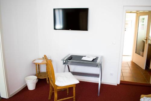 TV o dispositivi per l'intrattenimento presso Hotel Deutsches Haus