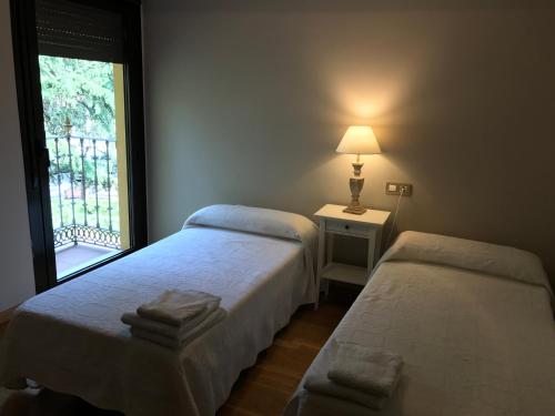 Letto o letti in una camera di Apartamento Balcon De Jaca I