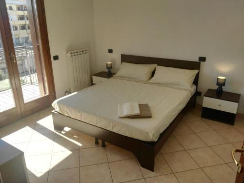 A bed or beds in a room at Residenza Gallura