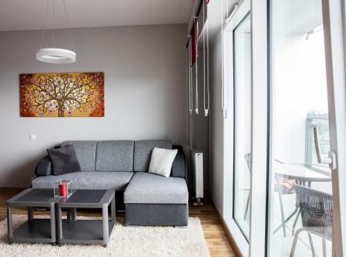Χώρος καθιστικού στο Apartamenty I.M.A Towarowa