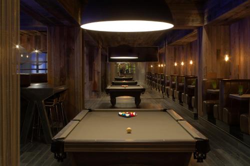 a billiard room with a pool table in it at Radisson Blu Mall of America in Bloomington