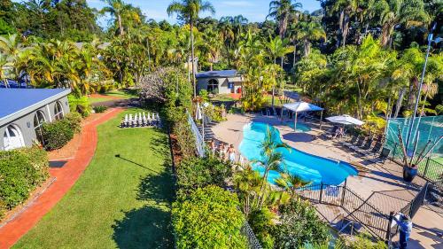 an aerial view of a resort with a swimming pool at Korora Bay Village Resort in Coffs Harbour