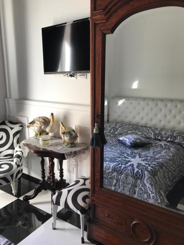 Katil atau katil-katil dalam bilik di B&B dell'orologio