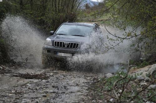a jeep driving through a mud covered road at Aloni Toy Kir Thanasi Hotel & Spa in Volakas
