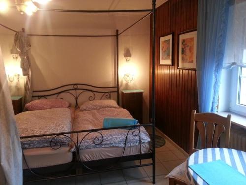Кровать или кровати в номере Landhotel Alte Mühle