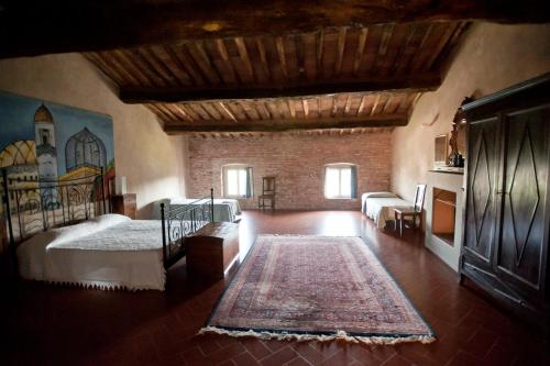 Postel nebo postele na pokoji v ubytování B&B Glicine e Luna