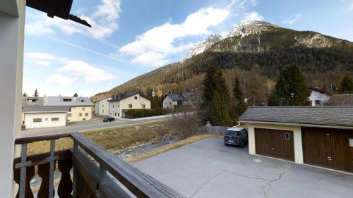 a view of a mountain from the balcony of a house at Sur Ovas 8 in La Punt-Chamues-ch