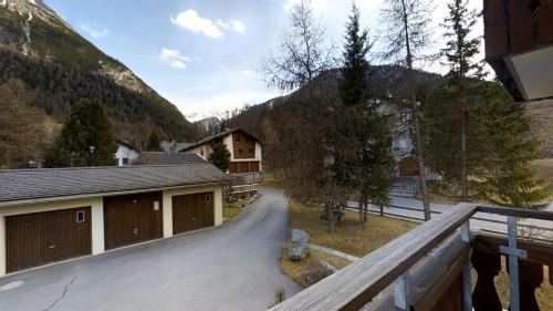 a view from a balcony of a house at Sur Ovas 8 in La Punt-Chamues-ch