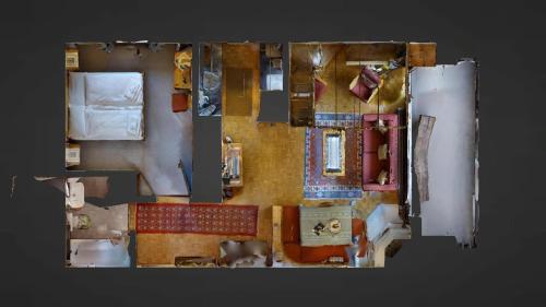 a floor plan of a room with a bedroom at Sur Ovas 8 in La Punt-Chamues-ch