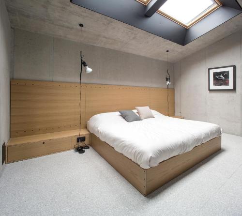 a bedroom with a large bed in a room at Fana Estate in Dobrovo