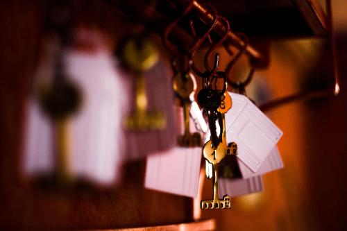a bunch of keys hanging from a hook at Hacienda Don Justo Hotel Boutique Spa in Colón