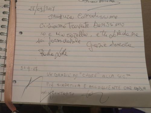 a sheet of paper with handwriting on it at Roma Gianicolense in Rome