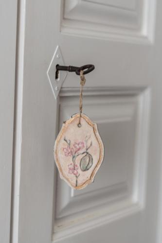 a door ornament hanging from a door knob at Masseria Luco in Martina Franca