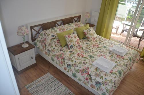 Posteľ alebo postele v izbe v ubytovaní Spring & Summer Apartments Polanki Park