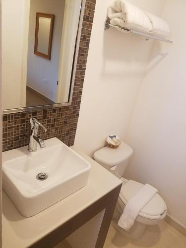 Koupelna v ubytování Hotel Quinta