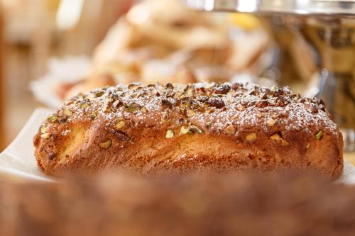 a piece of bread sitting on top of a plate at Residenza Paolo VI in Rome