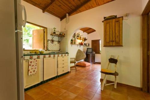 Η κουζίνα ή μικρή κουζίνα στο Coté Sud - Unique Villa & Bungalows Intendance Road