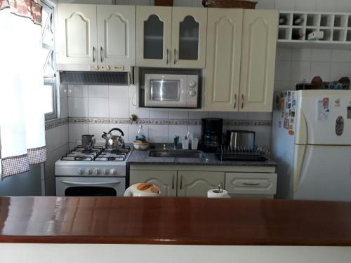 Dapur atau dapur kecil di Apartamento Lautaro