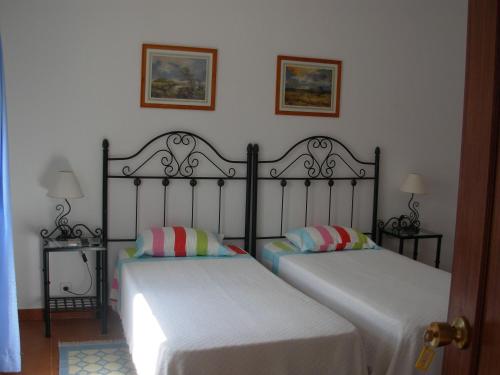 Ένα ή περισσότερα κρεβάτια σε δωμάτιο στο Quinta Paraiso