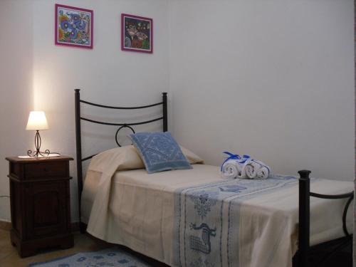 Кровать или кровати в номере Nonna Murtas