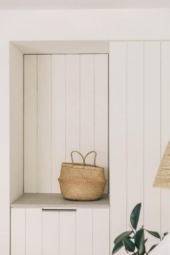 a basket sitting on a shelf in a room at The Surfrider Malibu in Malibu