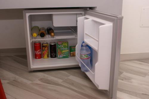 an open refrigerator with food and drinks in it at Il Diamante in Crotone