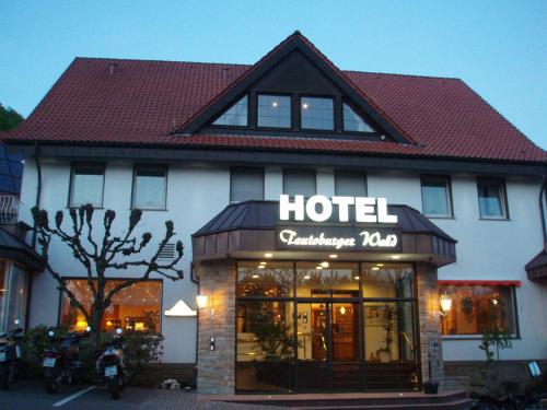a hotel with a sign on the front of it at Ringhotel Teutoburger Wald in Tecklenburg