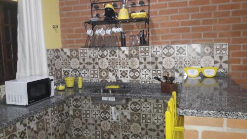 Dapur atau dapur kecil di Toca Hospedaria - Centro
