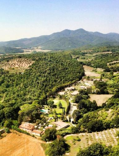 an aerial view of a valley with mountains in the background at Montebelli Agriturismo & Country Hotel in Caldana