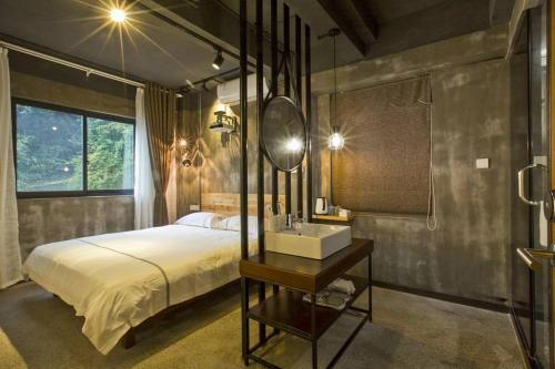 Postel nebo postele na pokoji v ubytování 0517 Boutique Hotel