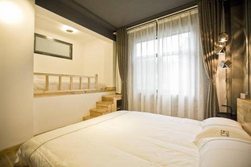 0517 Boutique Hotelにあるベッド