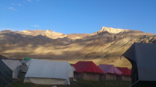 a group of tents in front of a mountain at Himalayan Routes Camp Sarchu in Sir Bhum Chun