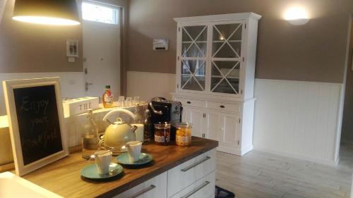 A kitchen or kitchenette at La Terrazza sul Naviglio B&B
