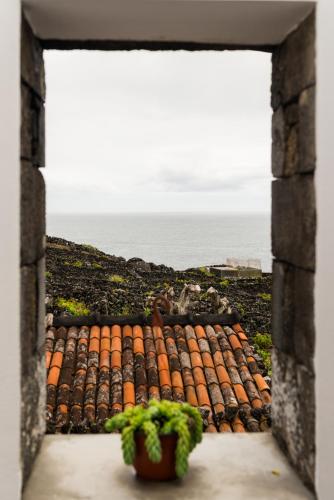 a view from a window of a roof at Ilhéu do Areeiro in Madalena