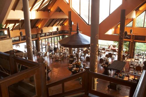 an overhead view of a restaurant with tables and chairs at Anantara Golden Triangle Elephant Camp & Resort in Golden Triangle