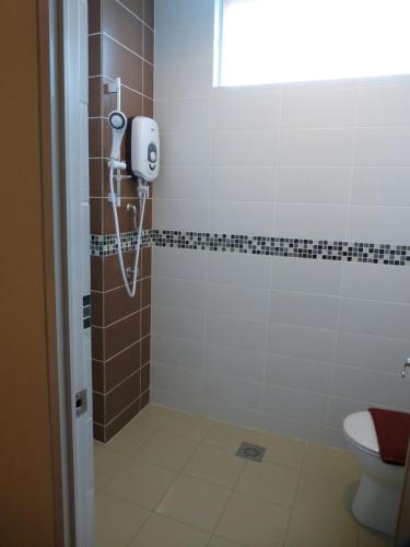 Ванная комната в Hotel 138 @ Bestari