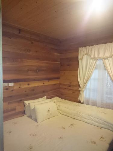 Posteľ alebo postele v izbe v ubytovaní Xin Cai Homestay