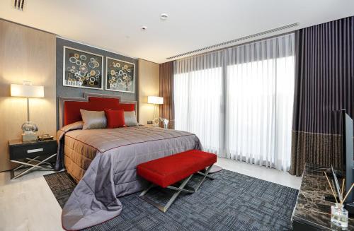 Ένα ή περισσότερα κρεβάτια σε δωμάτιο στο Mia City Hotel