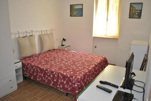 Postel nebo postele na pokoji v ubytování Camping Village Canapai