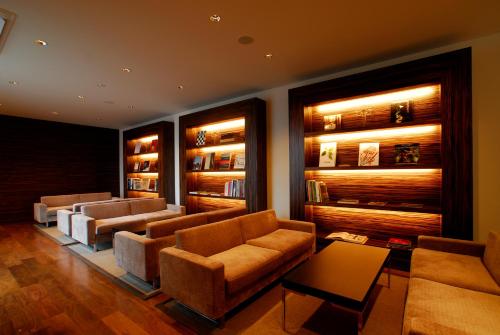 Ein Sitzbereich in der Unterkunft Scapes The Suite