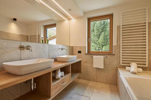 Ванная комната в Mountain Hotel Mezdì