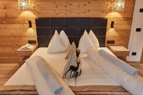 Mountain Hotel Mezdìにあるベッド
