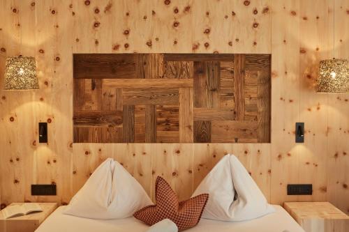 Mountain Hotel Mezdìにあるベッド