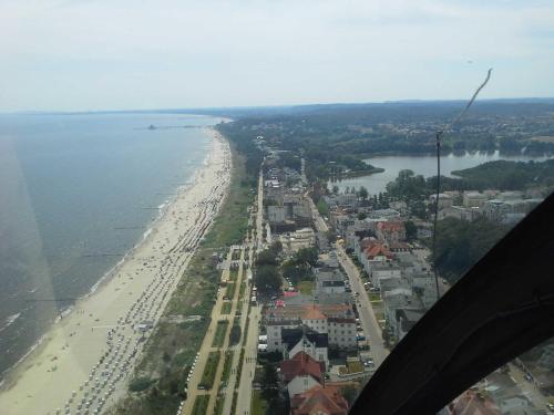 an aerial view of a beach and the ocean at Strandidyll 9 in Ueckeritz