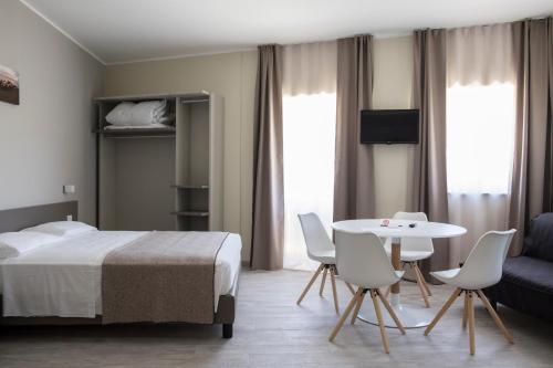 Posteľ alebo postele v izbe v ubytovaní Hotel & Wellness Stella Delle Langhe