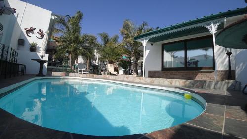 The swimming pool at or close to Blue Diamond Lodge & Spa