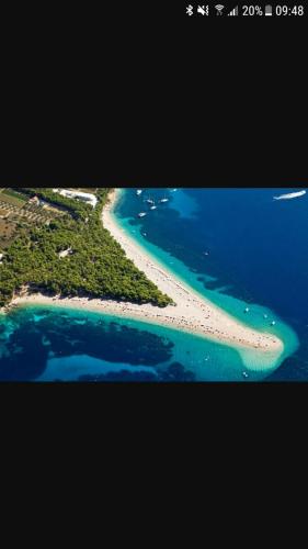 an aerial view of an island in the ocean at Apartments Jerica in Bol