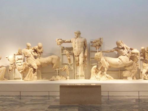a group of statues on display in a museum at Panorama in Skafidia