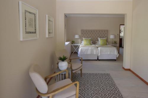 A bed or beds in a room at Cultivar Boutique Hotel