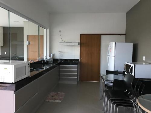 Η κουζίνα ή μικρή κουζίνα στο Casa Lago de Furnas